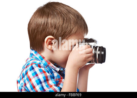 Little Boy fotografo riprese con fotocamera reflex isolato di close-up Foto Stock