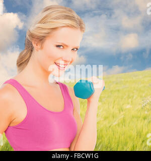 Immagine composita di felice fit donna Foto Stock