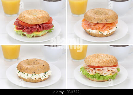 Raccolta di bagel sandwich per la prima colazione con salame prosciutto, salmone, la crema di formaggio, pomodori, lattuga, succo d'arancia e coff Foto Stock