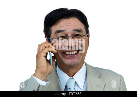 Sorridente imprenditore asiatico phone calling Foto Stock