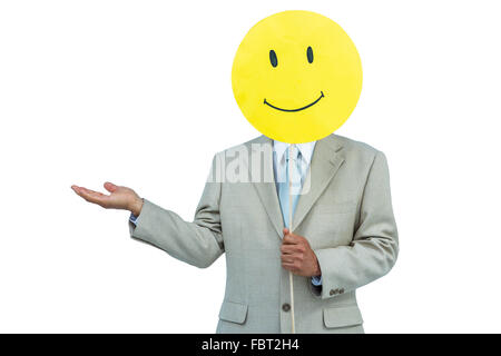 Imprenditore azienda felice Smiley face palloncino Foto Stock