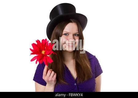 Giovane donna con fiore rosso Foto Stock