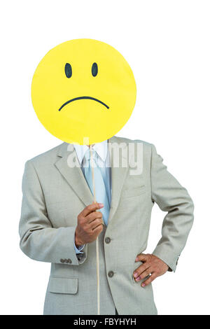 Imprenditore azienda angry Smiley face palloncino Foto Stock