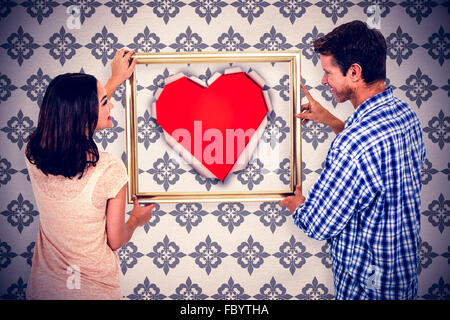 Immagine composita della coppia felice azienda cornice immagine Foto Stock