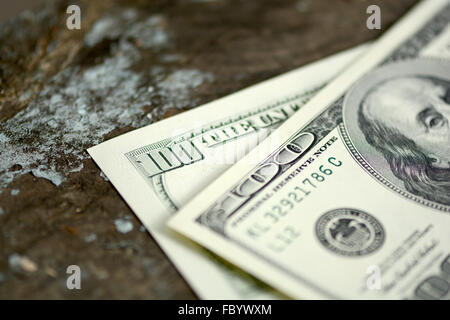Centinaia di dollari sul vecchio tavolato in legno Foto Stock