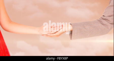 Immagine composita del hipster giovane in piedi mano nella mano Foto Stock