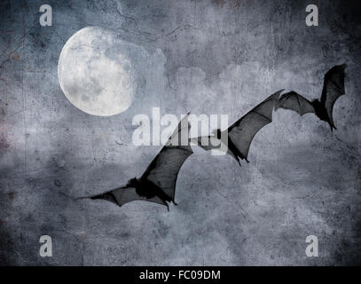 I pipistrelli nel cielo nuvoloso scuro, perfetto sfondo per Halloween Foto Stock