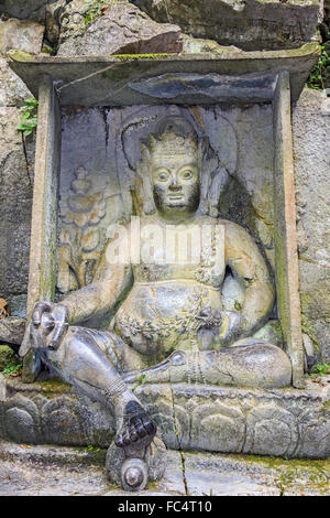 Statue di Buddha scolpita nella collina a Lingyin (Anime Retreat) Tempio in Hangzhou (Cina). Foto Stock