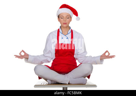 Cuocere nel cappuccio di Babbo Natale Foto Stock