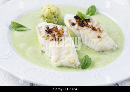 Filetto di merluzzo in basilico schiuma di Champagne Foto Stock