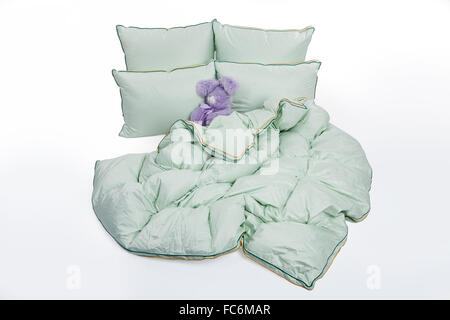 Cuscini in piuma e coperta Foto Stock