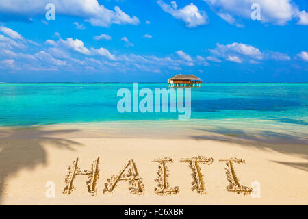 Parola Haiti sulla spiaggia Foto Stock