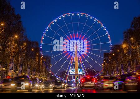 Ruota Panoramica SULLA PLACE DE LA CONCORDE e decorazioni di Natale, AVENUE DES CHAMPS ELYSEES DI PARIGI Foto Stock