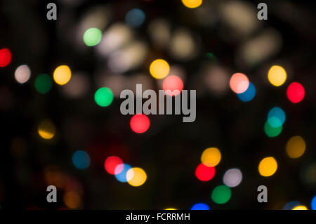 Abstract bokeh di fondo circolare di sfondo per le vacanze di Natale Luce Foto Stock