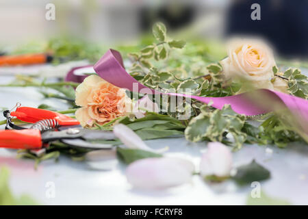 Fioraio foto concettuale. processo in officina Foto Stock