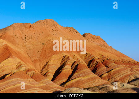 Cina, provincia di Gansu, colorato Danxia rilievi in Zhangye, Patrimonio Mondiale dell Unesco Foto Stock