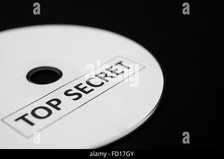 Compact disc con etichetta di top secret Foto Stock