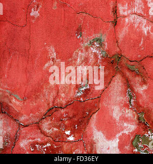 Creative bellissimo colore rosso brillante con macchie bianche sfondo, crepe e graffi sul cemento. Grungy superficie di calcestruzzo. Grande Foto Stock