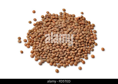 Cumulo di essiccato di lenticchie di montagna su sfondo bianco Foto Stock