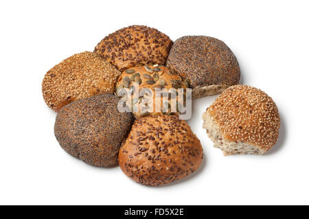 Fiori freschi di pane con semi diversi su sfondo bianco Foto Stock