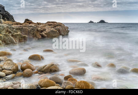 Receding marea, Porth Nanven, Cornwall Foto Stock