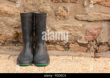 Gli agricoltori gumboots Foto Stock