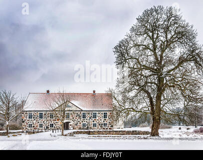 Vista di una coperta di neve Hovdala Castello nella regione Hassleholm. Hovdala Castle è un castello in Hassleholm comune, Scania, Foto Stock