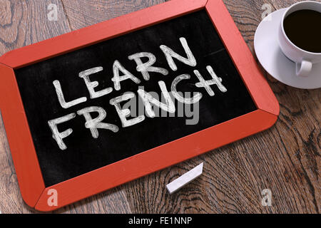 Imparare il francese concetto disegnati a mano sulla lavagna. Foto Stock