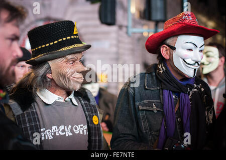 Manifestanti mascherati, milioni di maschera Marzo, Londra 2014 Foto Stock