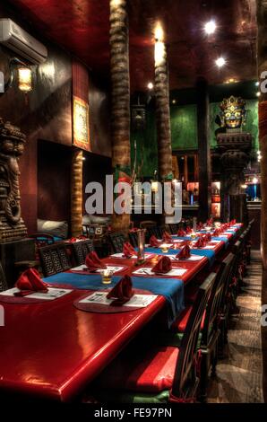 Esotico, rustico a tema asiatico sala da pranzo Foto Stock