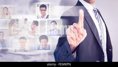 Immagine composita di imprenditore puntando con il suo dito Foto Stock