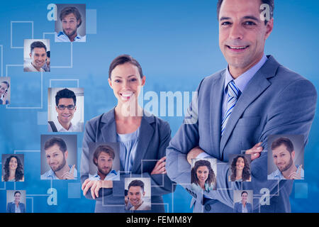 Immagine composita di colleghi d'affari sorridente in telecamera Foto Stock