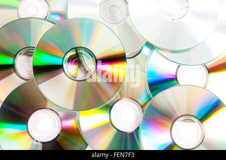 Di archiviazione ottica di cd cd pila pila di film musica film la pirateria dei dati digitali Foto Stock