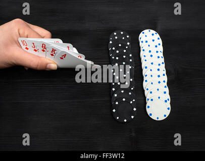 Carte da gioco isolato su sfondo nero, Royal Flush Foto Stock