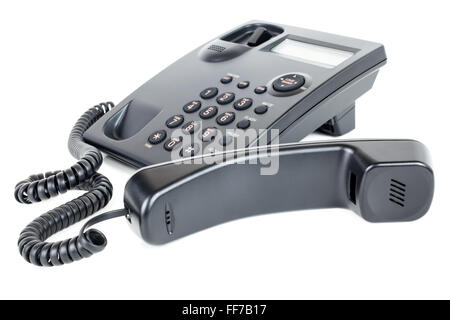 Immagine di un'azienda telefono fisso con il ricevitore sganciato recante nella parte anteriore del telefono Foto Stock