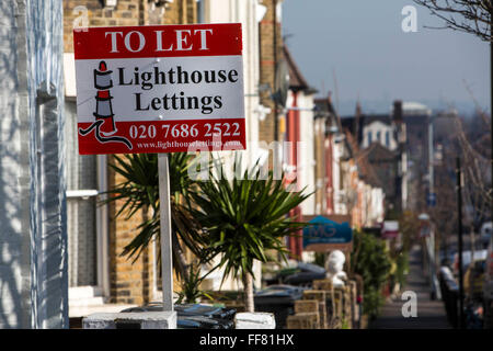 Lasciate che & per le vendite di segni, Duckett Road, Harringay, Londra, Regno Unito. Foto Stock