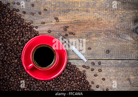 La vostra quotidiana shot di caffè con la coppa e la siringa Foto Stock