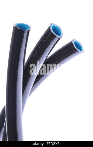 Pressione tubi flessibili in gomma isolati su sfondo bianco Foto Stock