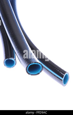 Pressione tubi flessibili in gomma isolati su sfondo bianco Foto Stock