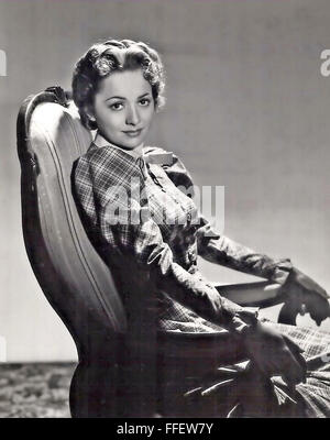 OLIVIA de Havilland anglo-americano attrice cinematografica nel carattere per il film 1938 Dodge City Foto Stock