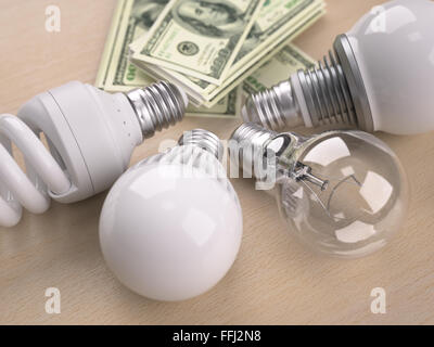 Diversi tipi di lampadine di fronte a un centinaio di dollari pila Foto Stock
