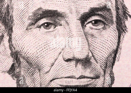Abraham Lincoln un close-up Verticale a noi cinque dollari Foto Stock