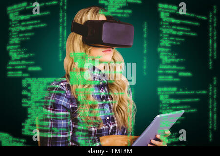 Immagine composita di pretty casual lavoratore utilizzando oculus rift Foto Stock