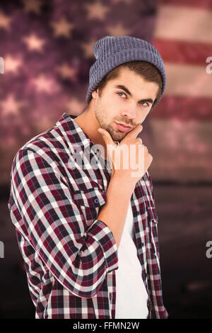 Immagine composita di pensosa uomo contro uno sfondo bianco Foto Stock