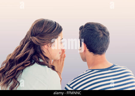 Immagine composita della donna sussurro segreto per ragazzo Foto Stock