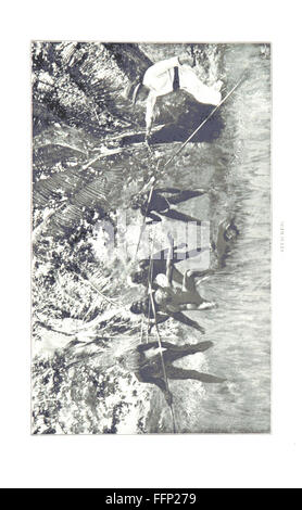 Questo libro d'epoca descrive un viaggio attraverso la nuova Guinea e le sue regioni circostanti, concentrandosi sulle culture locali e fornendo una mappa illustrata della zona. Foto Stock