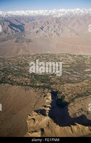 Aerial view of snow covered Himalayan mountains with Indus river , Ladakh , Jammu and Kashmir , India Foto Stock