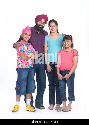 La religione sikh genitori con bambini signor#702X;702Y;702Z;779A Foto Stock