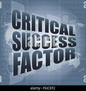 Fattore critico di successo di parole sul display digitale con mappa del mondo Foto Stock