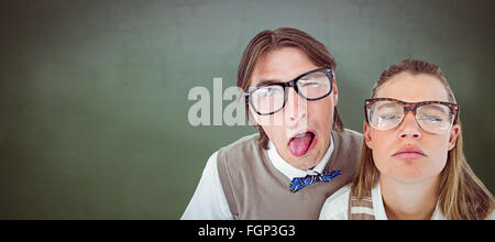 Immagine composita di divertenti geeky smorfie hipsters Foto Stock